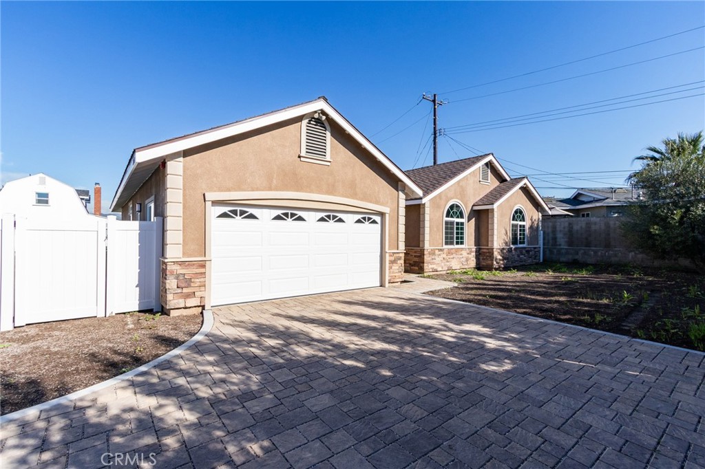 11128 Stamy Road Whittier, CA 90604 - Photo 7 of 40 a view of a house with a yard