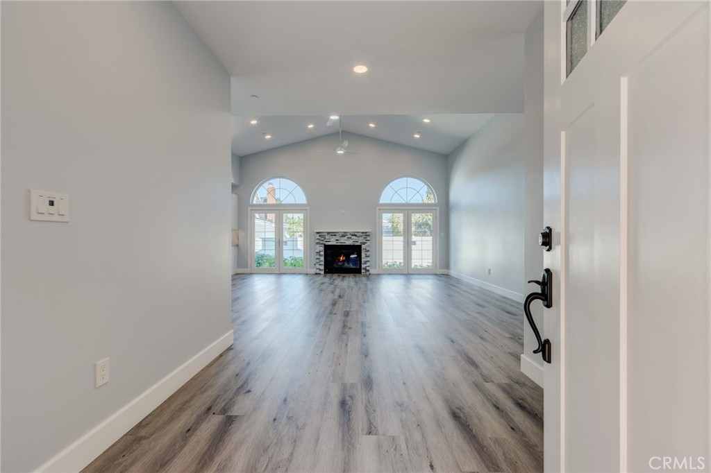 11128 Stamy Road Whittier, CA 90604 - Photo 10 of 40 wooden floor in living room with a window
