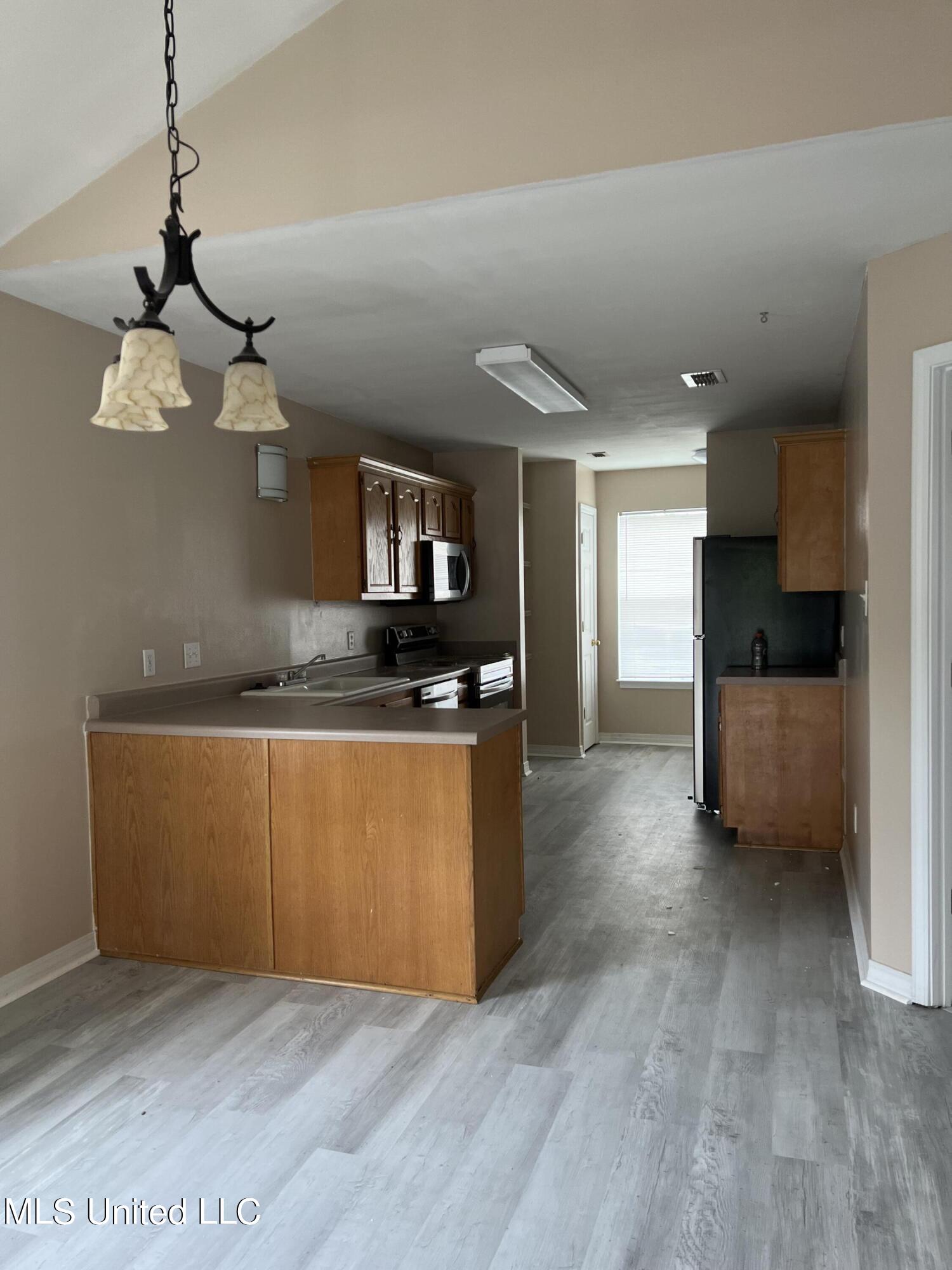 15055 Janus Road, Unit B D'Iberville, MS 39540 - Photo 4 of 9 Kitchen