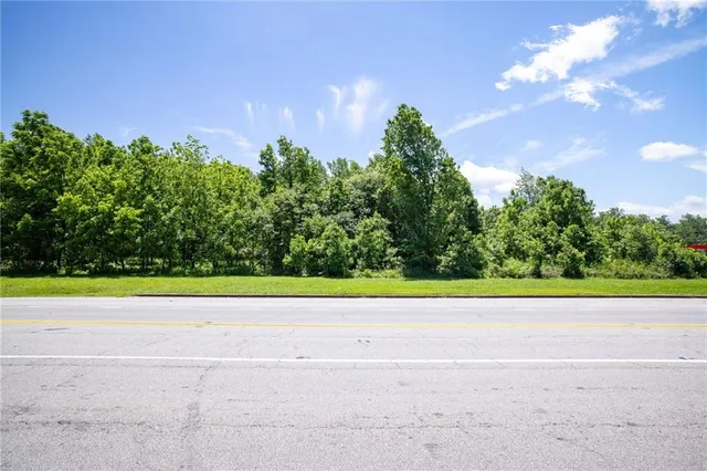 a view of a yard with an empty space