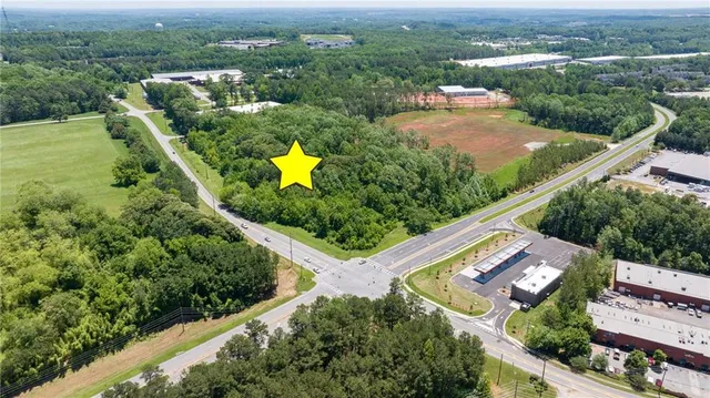 an aerial view of a house with a garden