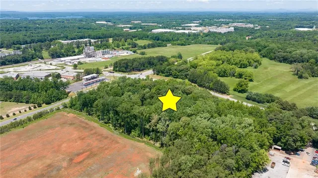 an aerial view of lake residential houses with outdoor space and swimming pool