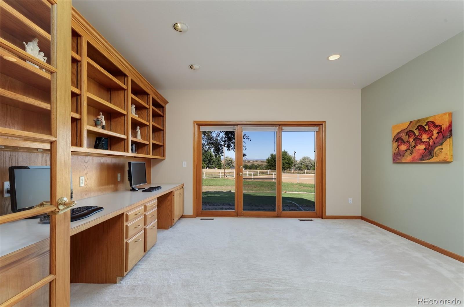 9741 Isabelle Road Lafayette, CO 80026 - Photo 20 of 39 a view of a big room with windows