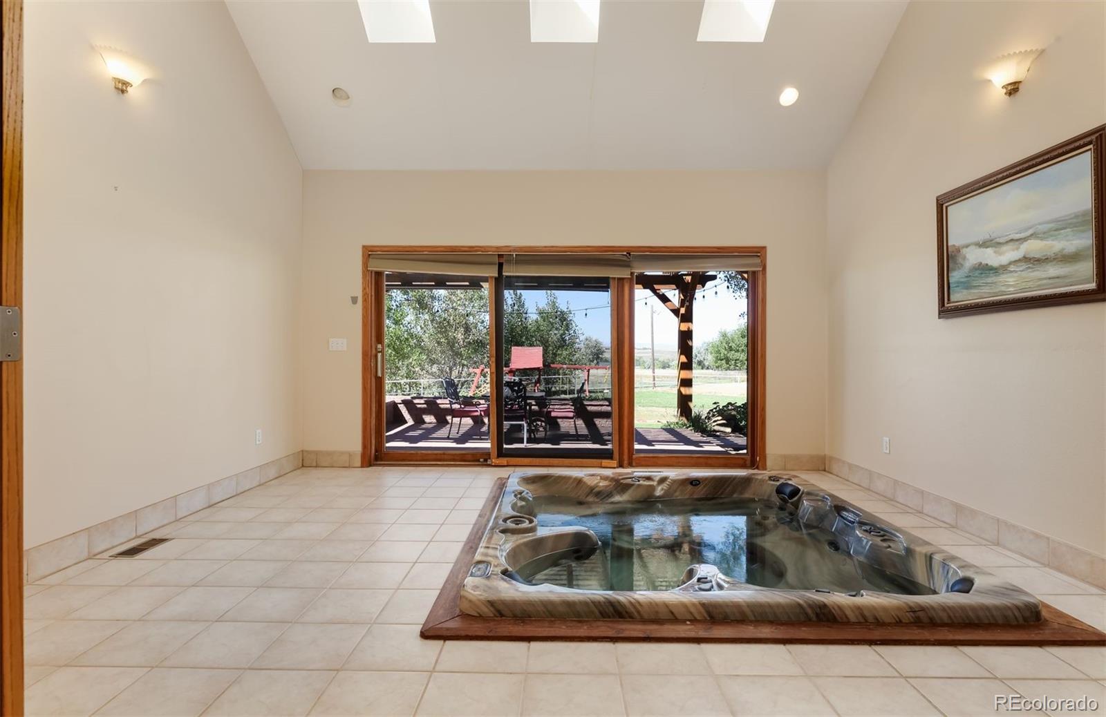 9741 Isabelle Road Lafayette, CO 80026 - Photo 21 of 39 a living room with a large window