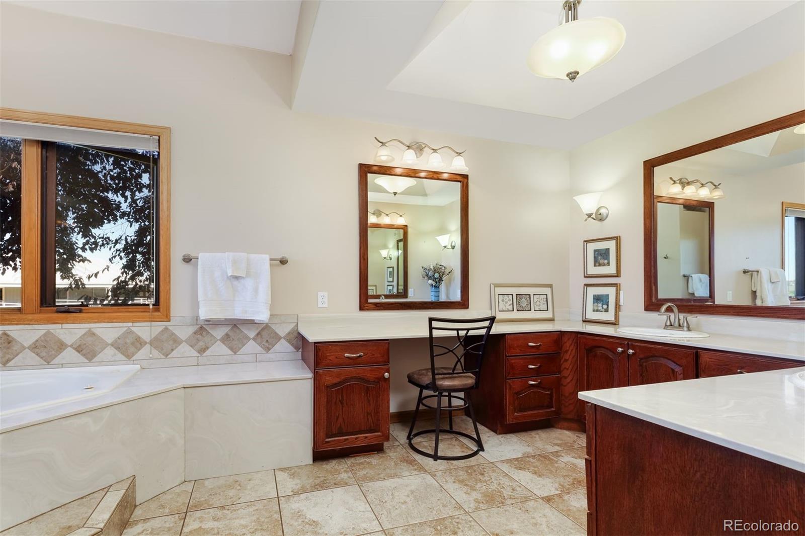 9741 Isabelle Road Lafayette, CO 80026 - Photo 24 of 39 a view of living room with granite countertop furniture and window