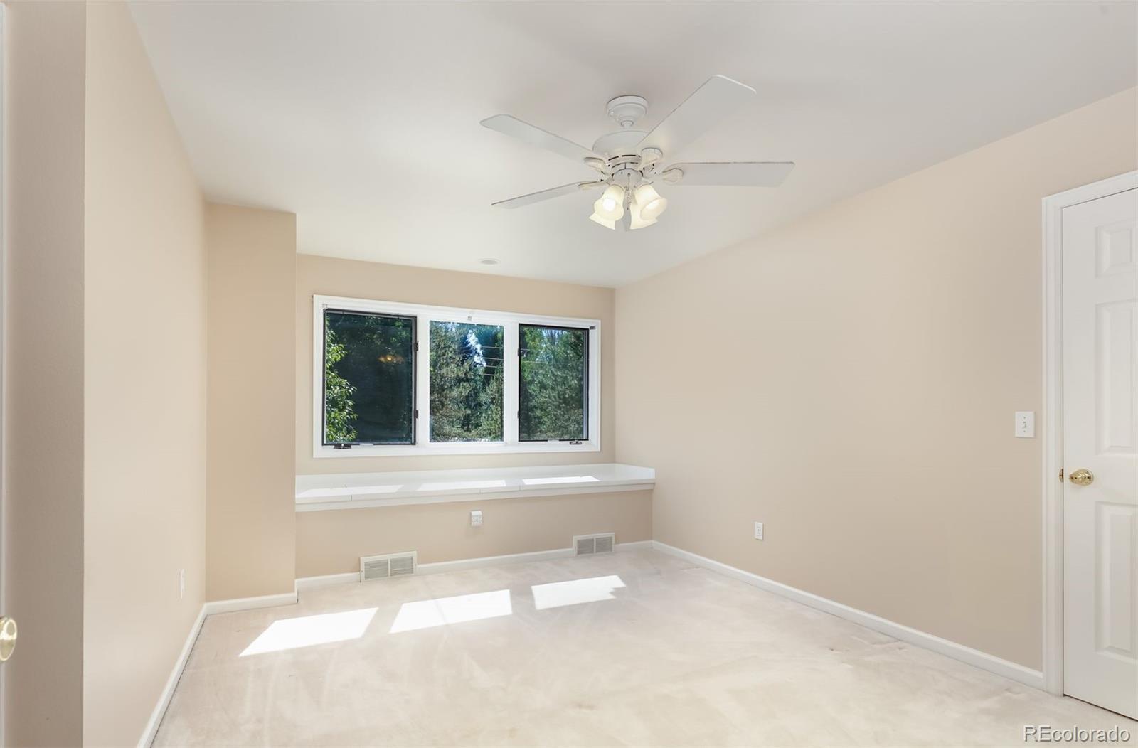 9741 Isabelle Road Lafayette, CO 80026 - Photo 30 of 39 an empty room with a window