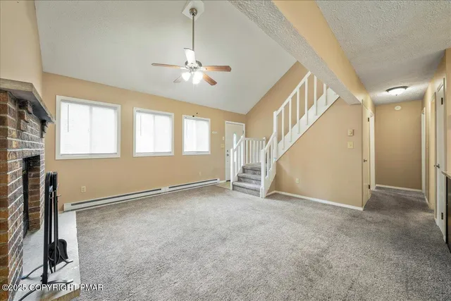 a bathroom with a sink mirror vanity and toilet
