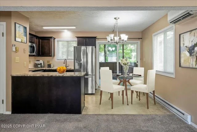 a bathroom with a sink toilet tub and shower