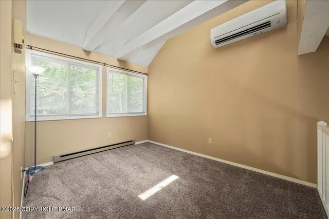 a view of a park with iron fence