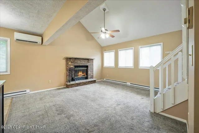 a kitchen with stainless steel appliances granite countertop a refrigerator and a stove