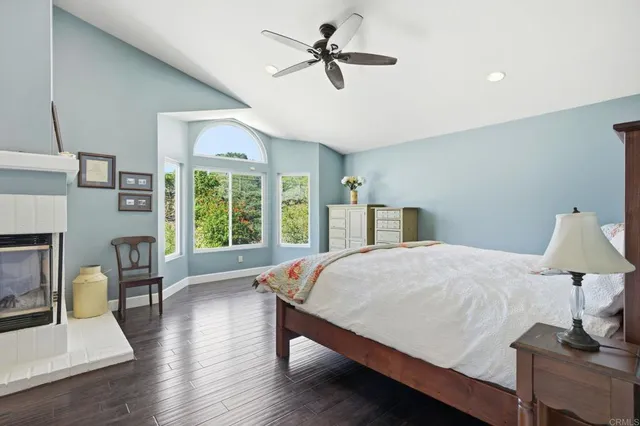 a bed room with a bed and a chair