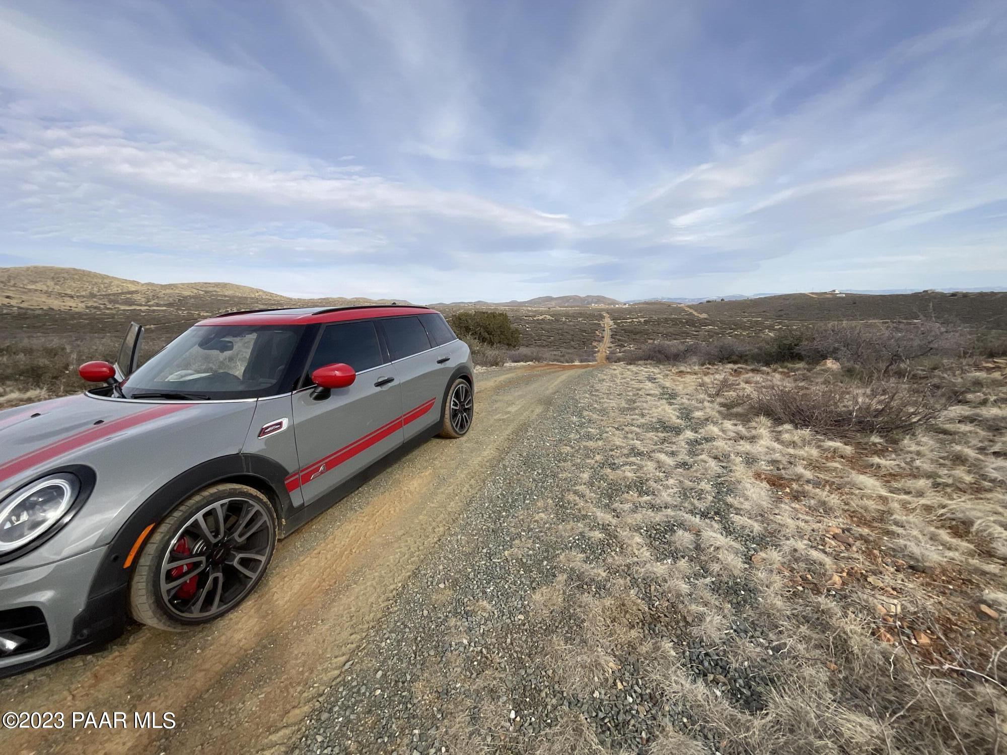 Dewey-humboldt North Az 86327 Road Dewey, AZ 86327 - Photo 8 of 14 a view of car parked in front of a building