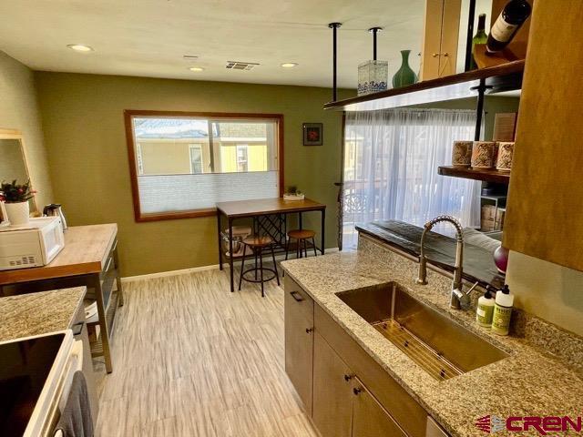 251 Gothic Road, Unit 3 Crested Butte, CO 81225 - Photo 1 of 31 Updated Kitchen new cabinets, counter tops and farm sink