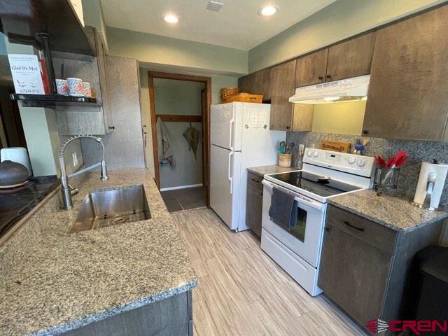 251 Gothic Road, Unit 3 Crested Butte, CO 81225 - Photo 2 of 31 looking towards the entrance area with coat hooks