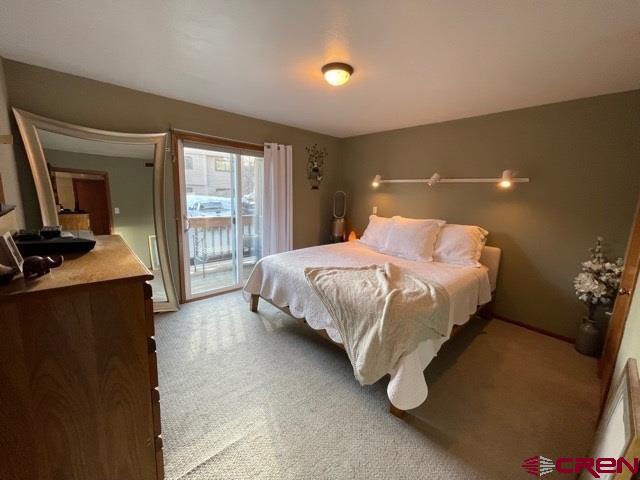 251 Gothic Road, Unit 3 Crested Butte, CO 81225 - Photo 4 of 31 king size bed and private deck