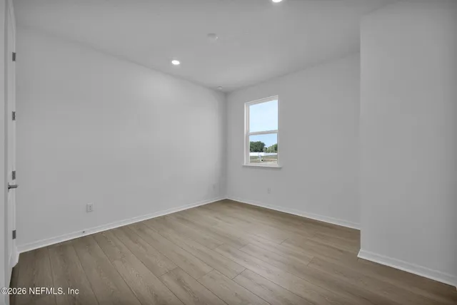 an empty room with windows