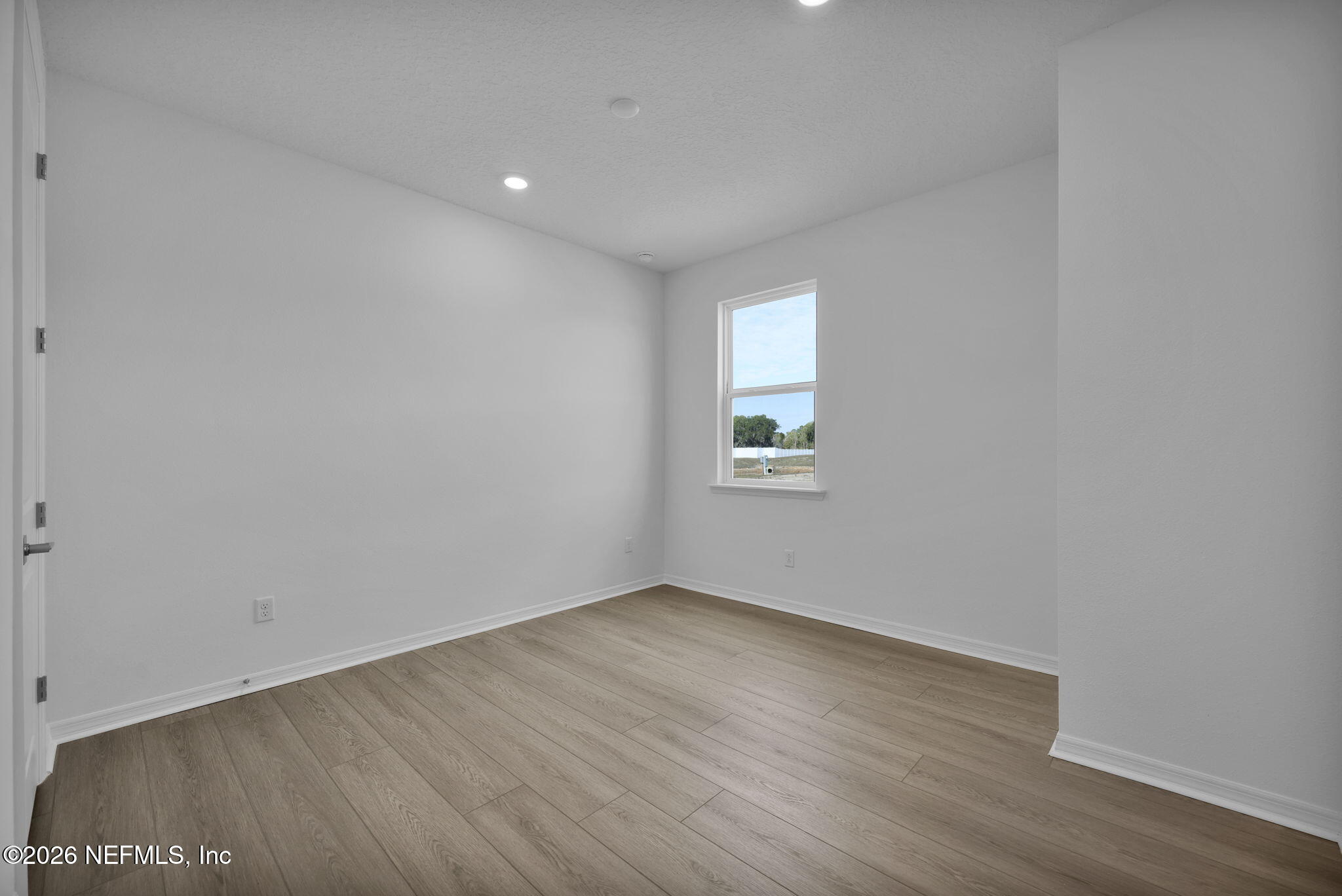 1706 Mickey Way Middleburg, FL 32068 - Photo 21 of 27 wooden floor in an empty room