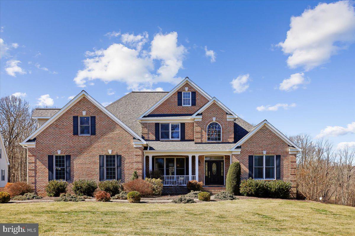 496 Leisters Church Road Westminster, MD 21157 - Photo 107 of 118 a front view of a house with a yard