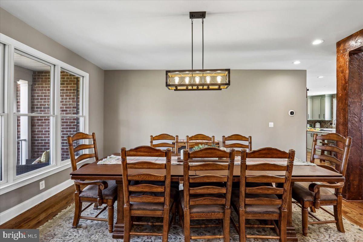 496 Leisters Church Road Westminster, MD 21157 - Photo 16 of 118 a view of a dining room with furniture and window