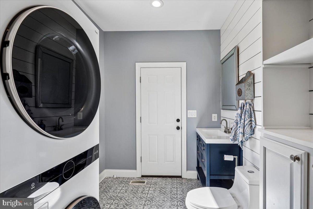 496 Leisters Church Road Westminster, MD 21157 - Photo 28 of 118 a bathroom with a sink and a mirror