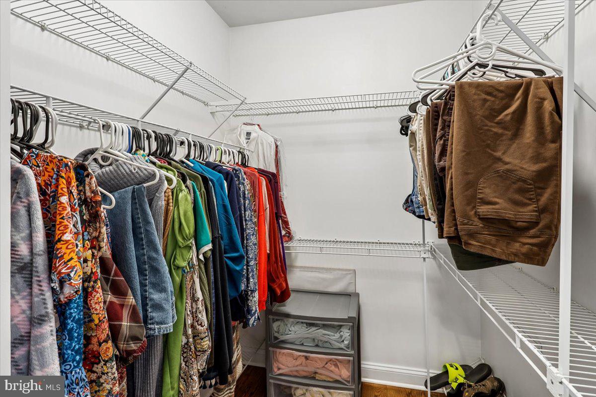 496 Leisters Church Road Westminster, MD 21157 - Photo 37 of 118 a view of walk in closet with clothes and shoes