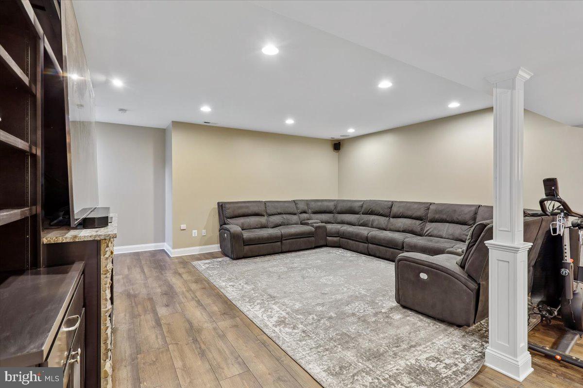 496 Leisters Church Road Westminster, MD 21157 - Photo 73 of 118 a living room with furniture and a flat screen tv