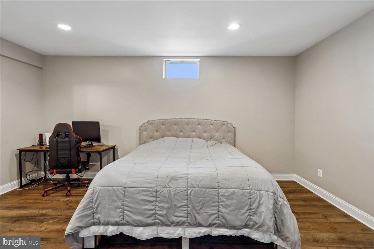 496 Leisters Church Road Westminster, MD 21157 - Photo 85 of 118 a bedroom with a bed and wooden floor