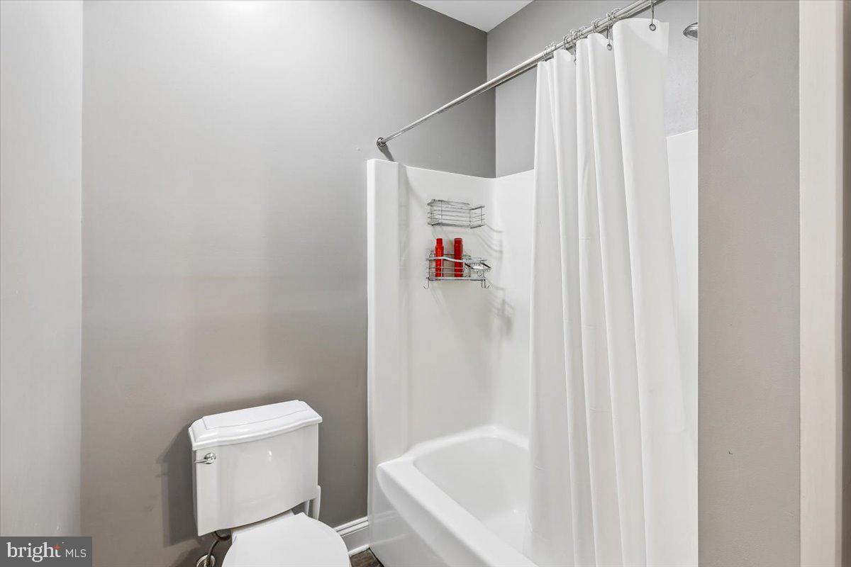 496 Leisters Church Road Westminster, MD 21157 - Photo 90 of 118 a white toilet sitting next to a white sink