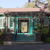 a view of a house with a garden