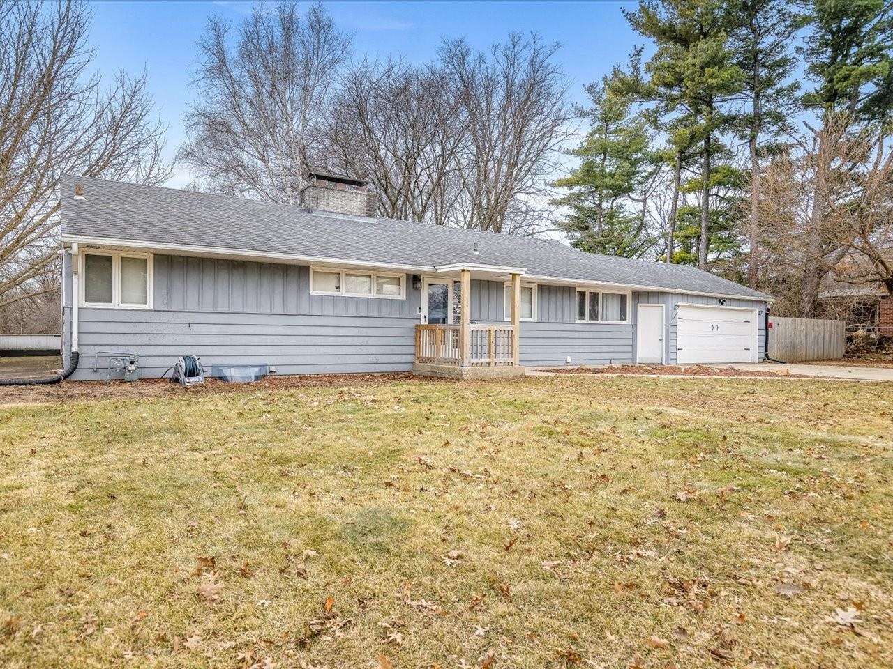 3215 Rural Street Rockford, IL 61107 - Photo 2 of 25 a front view of a house with an outdoor space