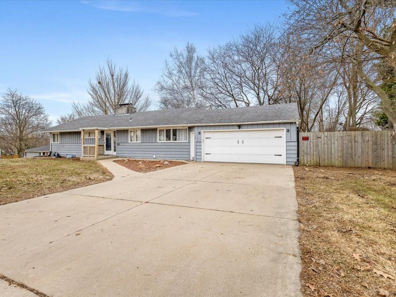 3215 Rural Street Rockford, IL 61107 - Photo 4 of 25 a front view of a house with a yard