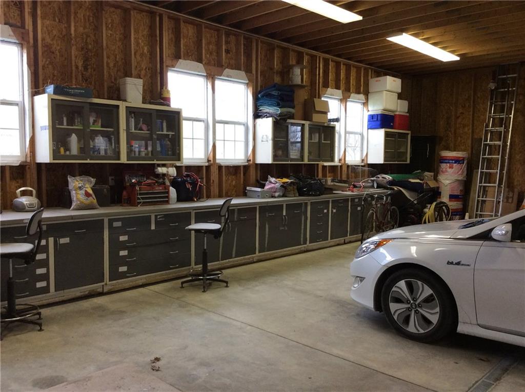 1470 East Cruikshank Road Valencia, PA 16059 - Photo 22 of 25 Look at the amount of cabinets to stay organized and provide work space. Garage is deep enough and high enough oversized vehicles.