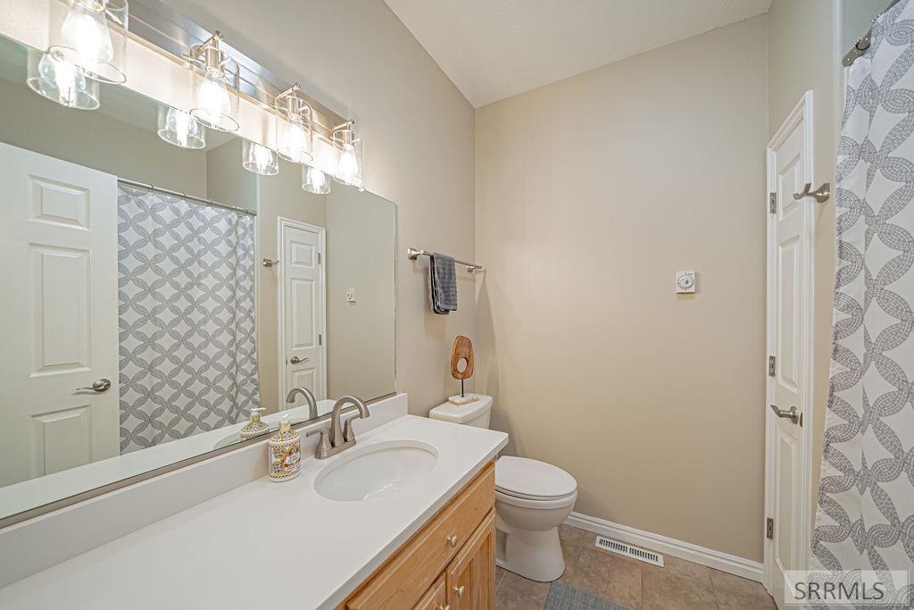 7121 South Culebra Rio Circle Idaho Falls, ID 83406 - Photo 42 of 90 Main Floor Bathroom