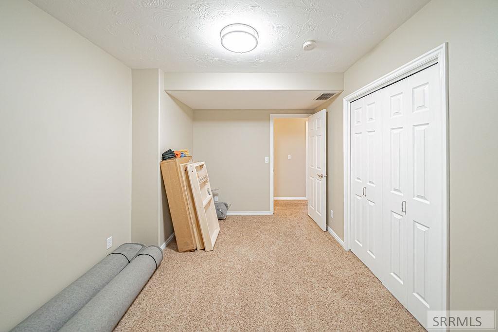 7121 South Culebra Rio Circle Idaho Falls, ID 83406 - Photo 56 of 90 Basement Bedroom #1