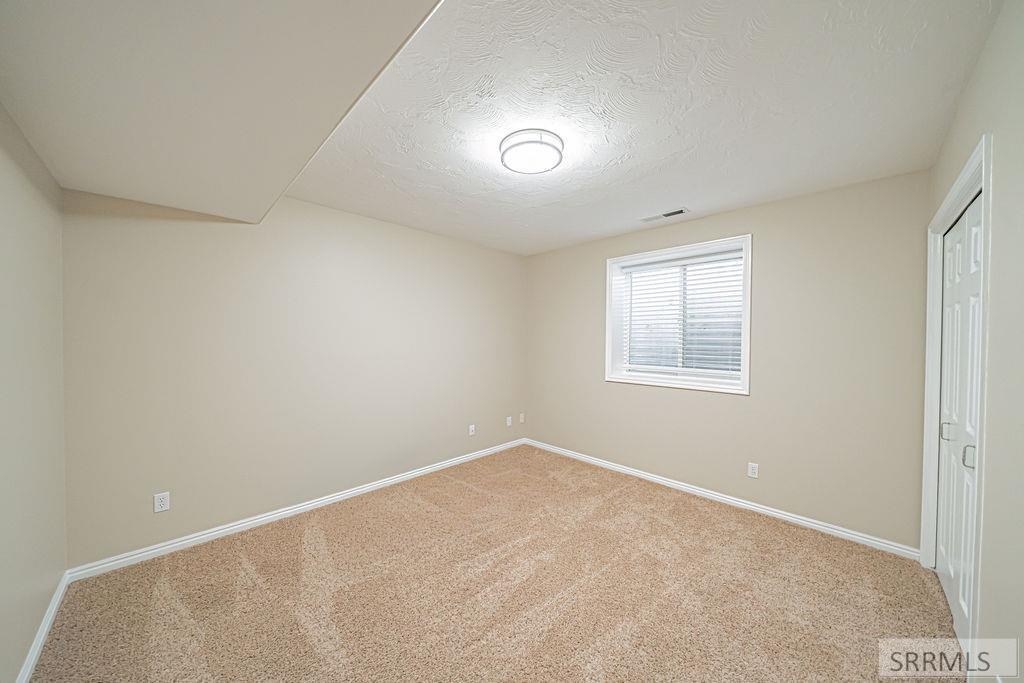 7121 South Culebra Rio Circle Idaho Falls, ID 83406 - Photo 65 of 90 Basement Bedroom #3