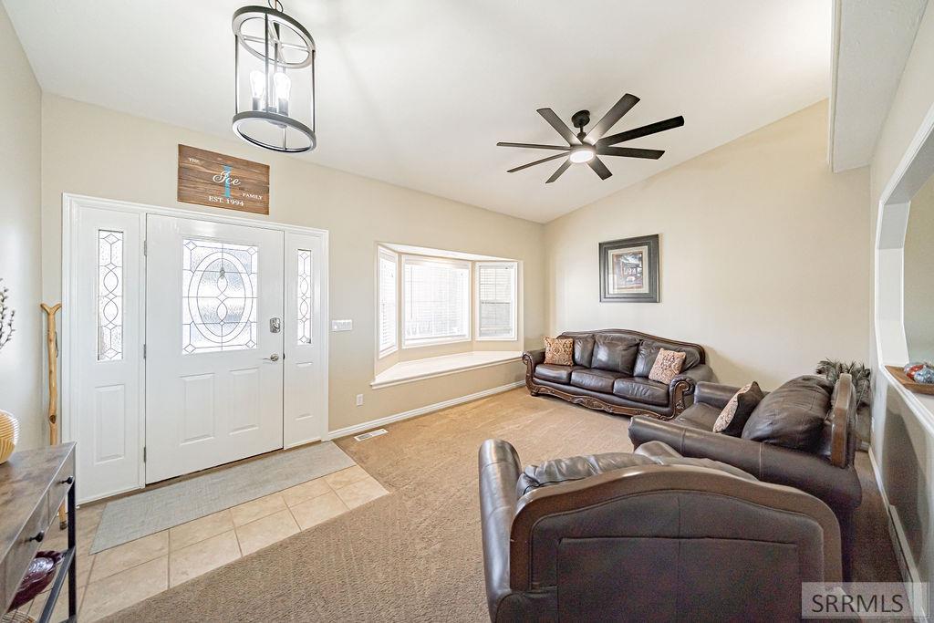 7121 South Culebra Rio Circle Idaho Falls, ID 83406 - Photo 7 of 90 Front Entryway and Main Floor Family Room