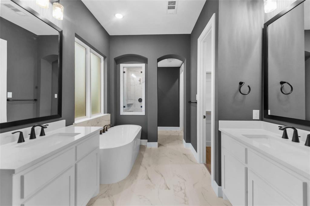15577 Desert Broom Road Frisco, TX 75035 - Photo 15 of 37 a spacious bathroom with a double vanity sink mirror and double