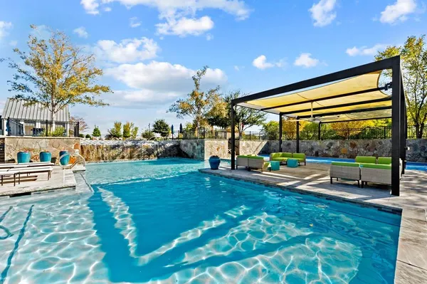 a view of a garden with patio