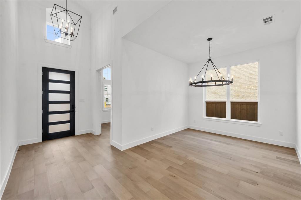 15577 Desert Broom Road Frisco, TX 75035 - Photo 4 of 37 a view of empty room with windows