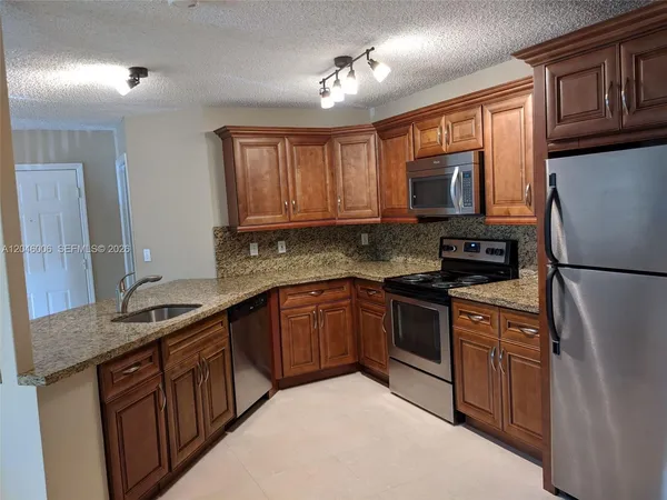 $240,000 | 4015 West McNab Road, Unit D210, Pompano Beach, FL 33069