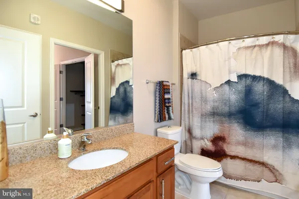 a view of closet area with empty racks