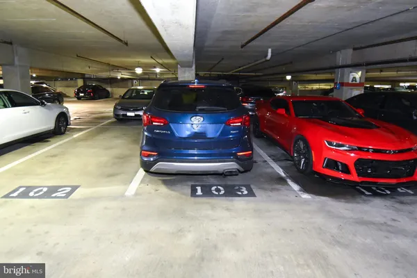 a view of a chairs and table in the balcony