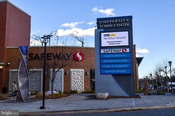 a sign on the side of the street