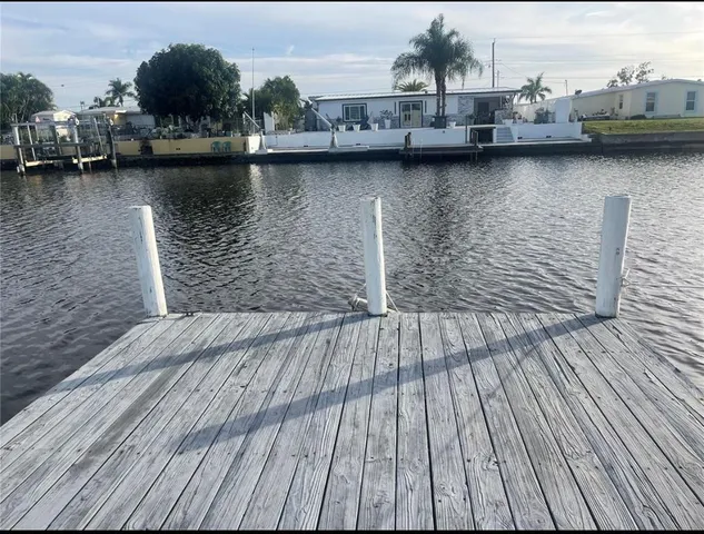 a view of a swimming pool with a patio