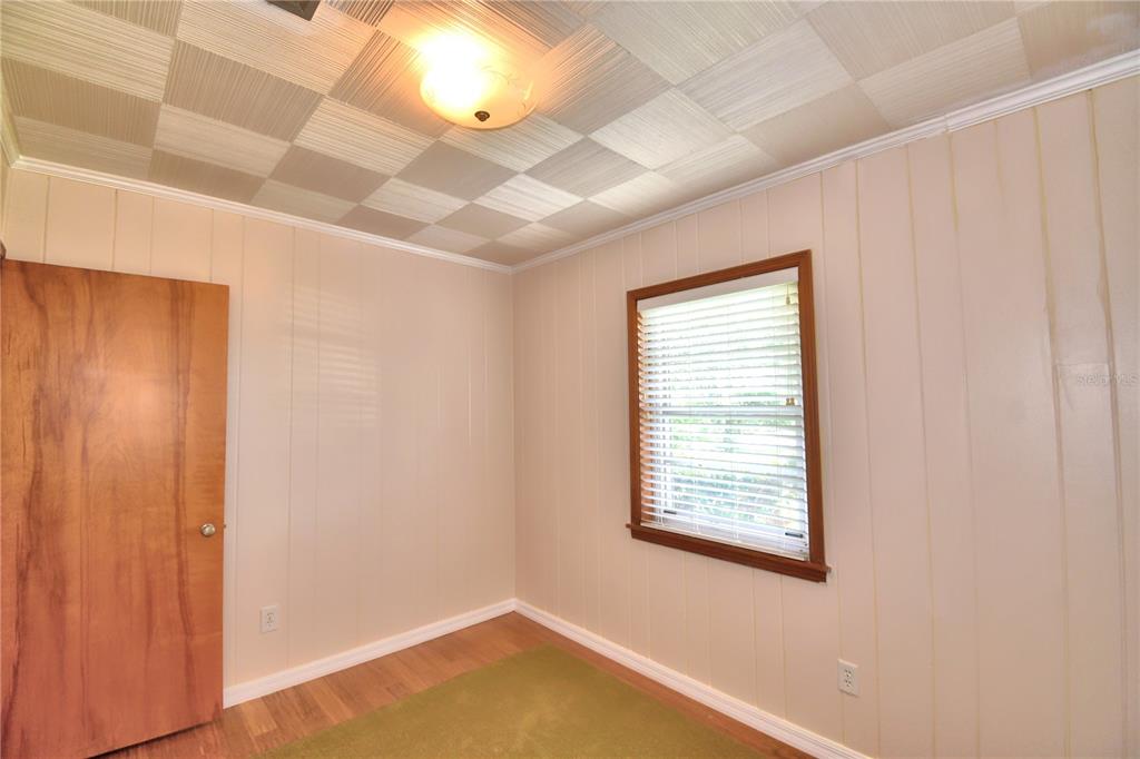1475 Lake Howard Drive Southwest Winter Haven, FL 33880 - Photo 15 of 25 a view of an empty room with a window