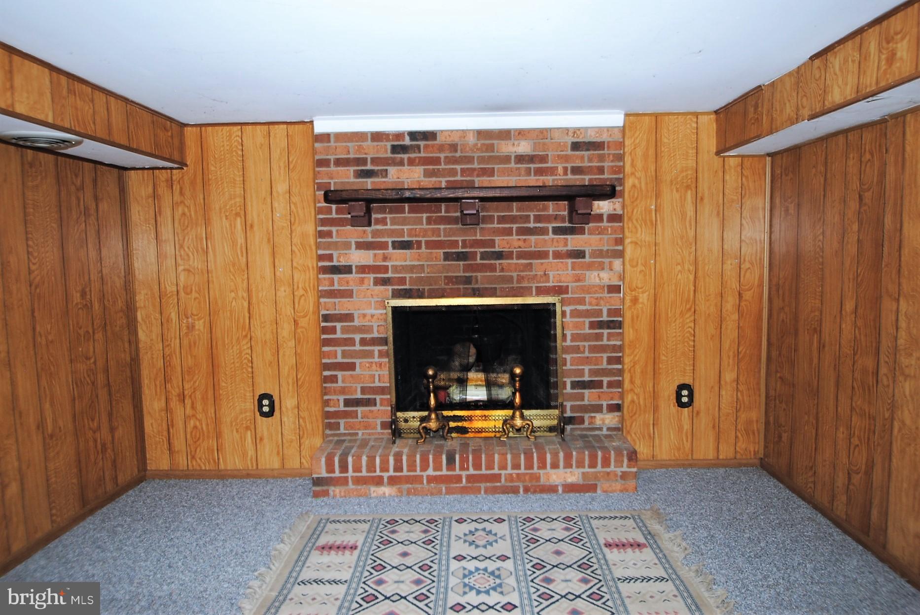 355 Maloney Road Elkton, MD 21921 - Photo 16 of 26 Beautiful brick fireplace and still more space!