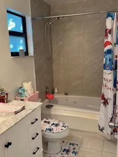 a view of hall way with furniture and toys