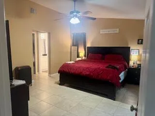 a room with furniture and a large window