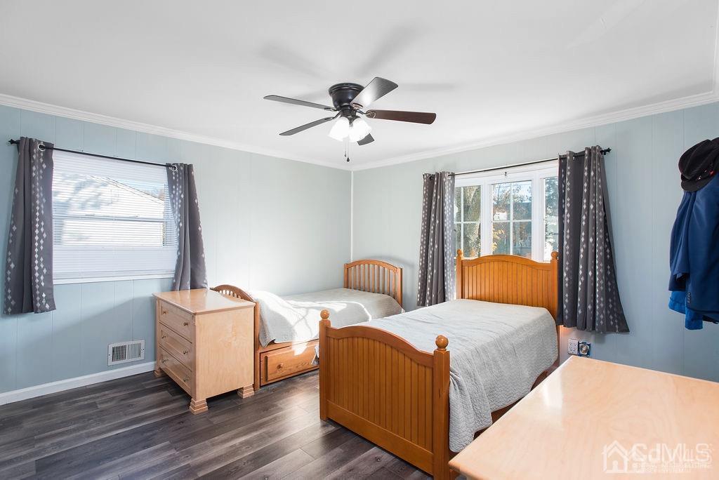 566 New Dover Road Colonia, NJ 07067 - Photo 11 of 23 a bedroom with bed and a window
