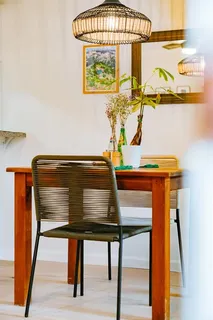 a view of a room with mirror and window